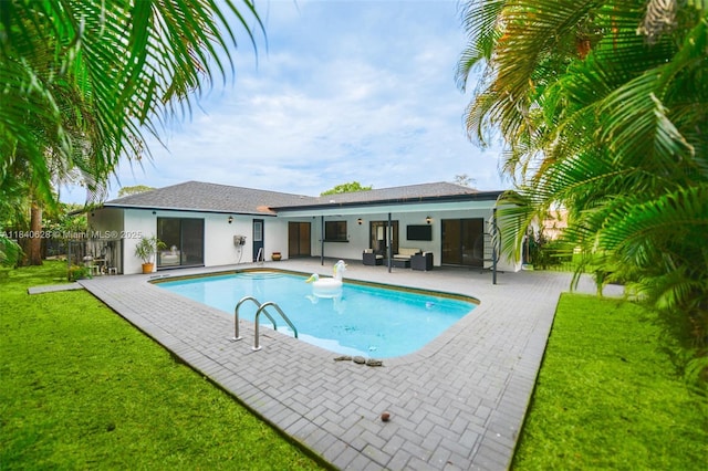 13526 Jonquil Pl, Wellington, FL 33414 - view of swimming pool featuring a patio
