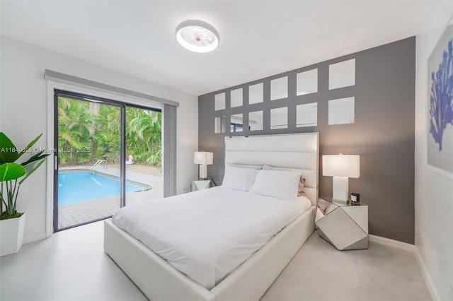 13526 Jonquil Pl, Wellington, FL 33414 - bedroom with access to exterior and concrete flooring