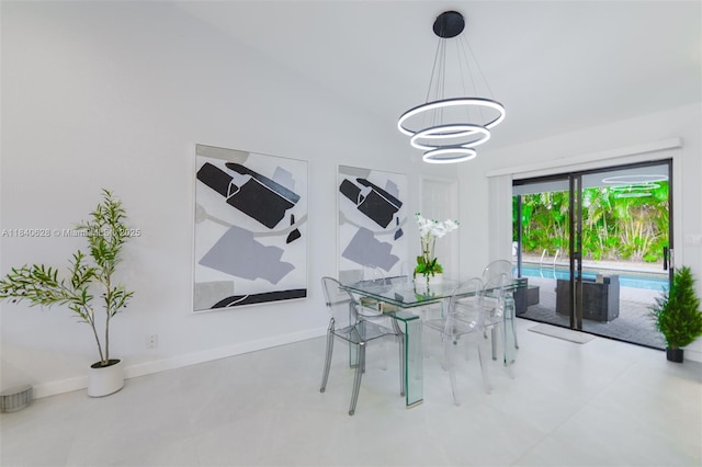 13526 Jonquil Pl, Wellington, FL 33414 - dining space featuring a chandelier and baseboards
