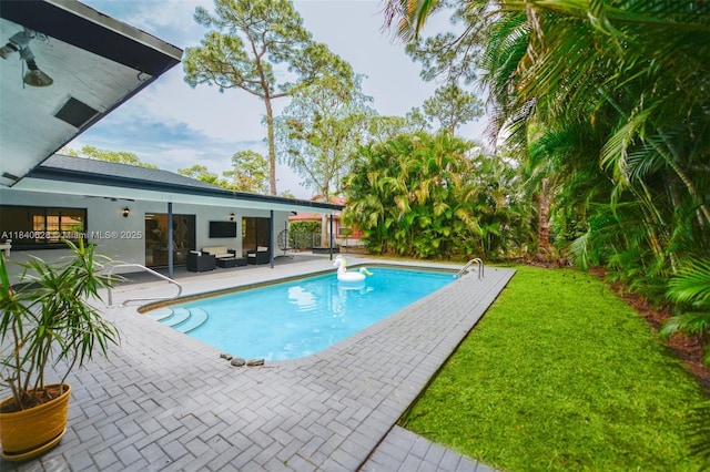 13526 Jonquil Pl, Wellington, FL 33414 - swimming pool with a patio area and outdoor lounge area