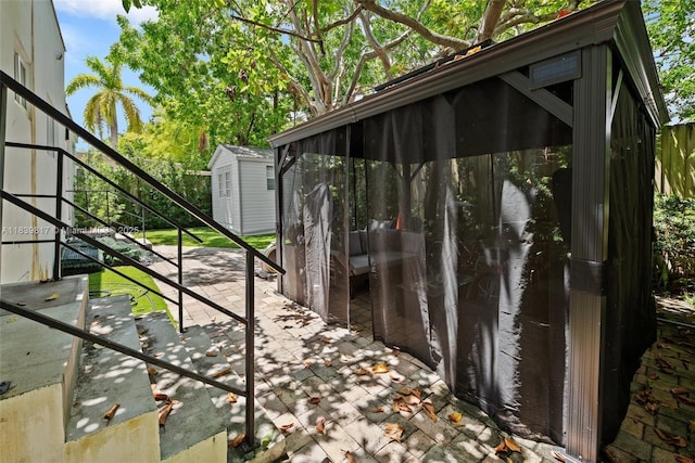 2511 Tequesta Ln, Coconut Grove, FL 33133 - view of patio / terrace with stairs and a shed