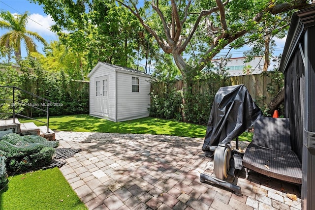 2511 Tequesta Ln, Coconut Grove, FL 33133 - fenced backyard featuring a patio area and a storage shed