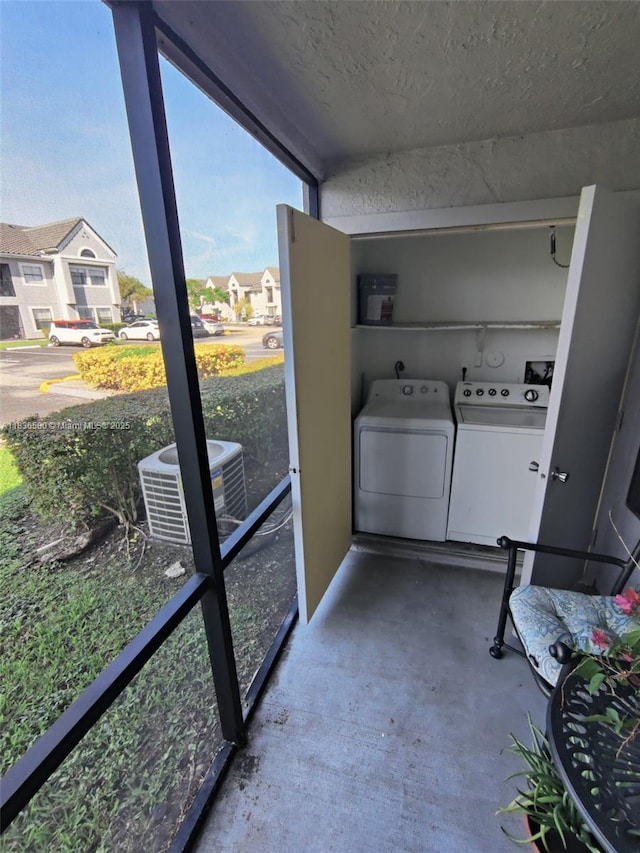 10361 SW 150th Ct Unit 13104, Miami, FL 33196 - laundry room with washing machine and clothes dryer and a residential view