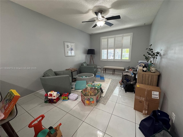 14972 SW 50th Ct, Davie, FL 33331 - living room with ceiling fan, a textured ceiling, and tile patterned flooring