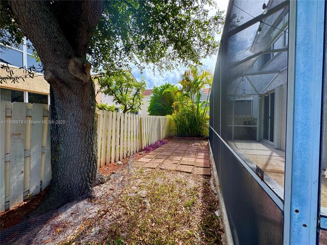 14972 SW 50th Ct, Davie, FL 33331 - fenced backyard featuring a patio area