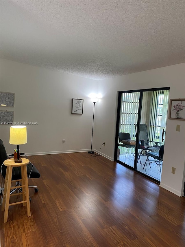 10407 E Clairmont Cir Unit 210, Tamarac, FL 33321 - unfurnished room featuring a textured ceiling and wood finished floors
