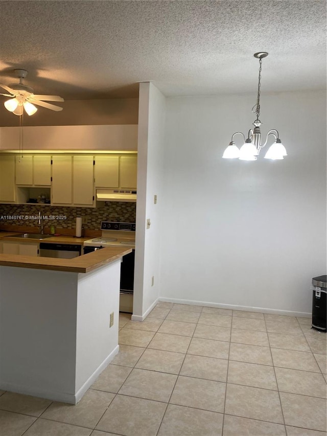 10407 E Clairmont Cir Unit 210, Tamarac, FL 33321 - kitchen featuring white range with electric cooktop, ceiling fan, light tile patterned floors, tasteful backsplash, and a textured ceiling