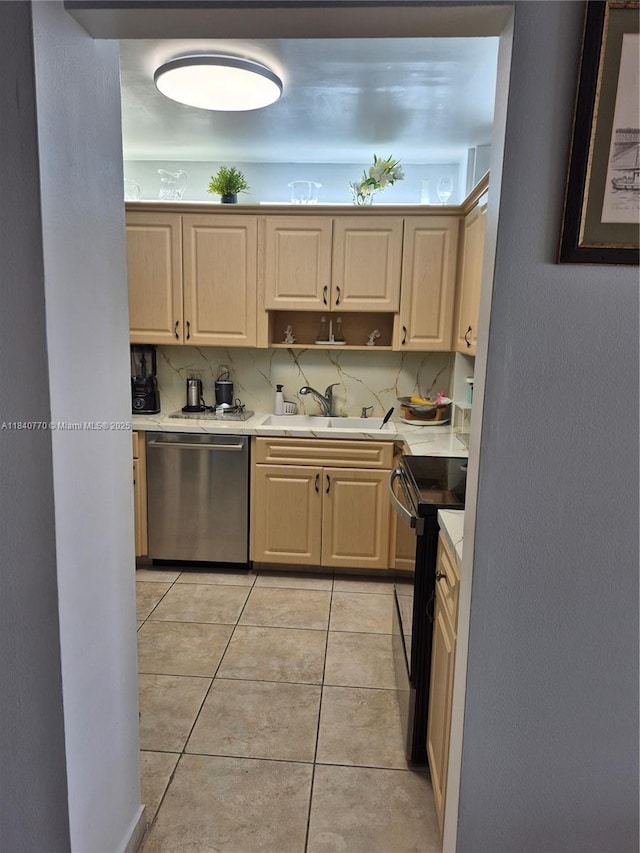 4001 Hillcrest Dr Unit 705, Hollywood, FL 33021 - kitchen featuring light countertops, appliances with stainless steel finishes, light tile patterned flooring, and light brown cabinets