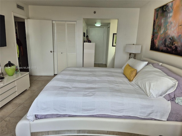 4001 Hillcrest Dr Unit 705, Hollywood, FL 33021 - bedroom with tile patterned floors and a closet