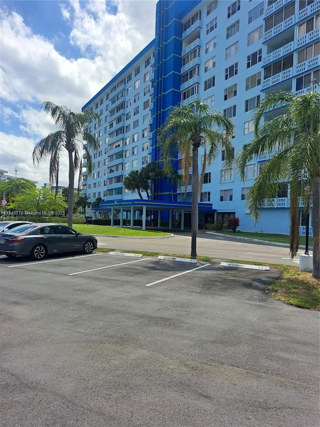 4001 Hillcrest Dr Unit 705, Hollywood, FL 33021 - view of apartment building / complex featuring uncovered parking