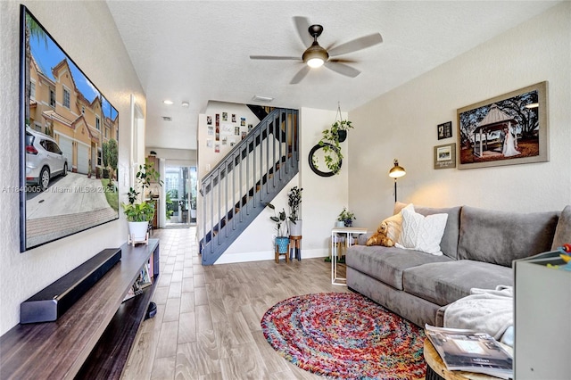 8657 SW 22nd Ct, Miramar, FL 33025 - living room with stairway, ceiling fan, wood finished floors, a textured ceiling, and recessed lighting