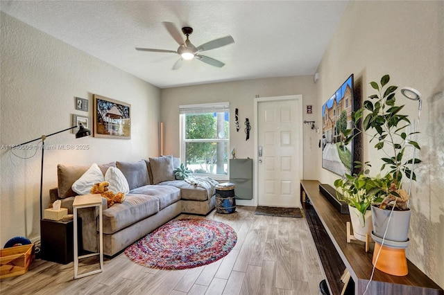 8657 SW 22nd Ct, Miramar, FL 33025 - living room featuring ceiling fan, wood finished floors, and a textured wall