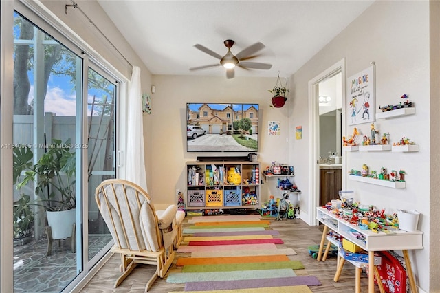 8657 SW 22nd Ct, Miramar, FL 33025 - playroom with ceiling fan and wood finished floors