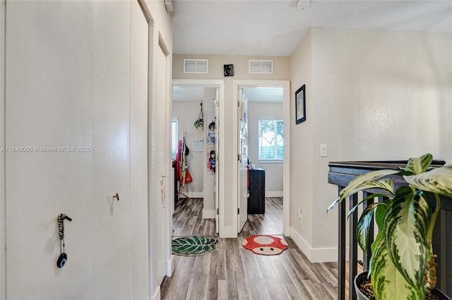8657 SW 22nd Ct, Miramar, FL 33025 - hallway with wood finished floors and baseboards