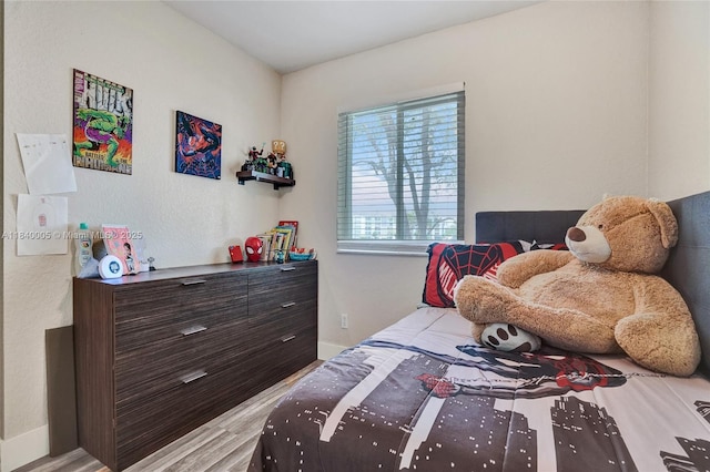 8657 SW 22nd Ct, Miramar, FL 33025 - bedroom featuring wood finished floors and baseboards