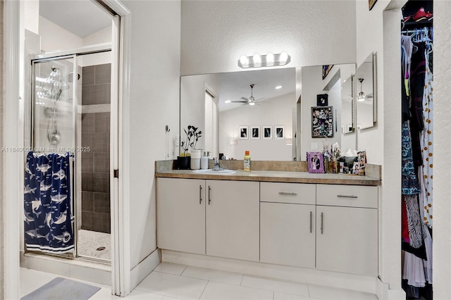 8657 SW 22nd Ct, Miramar, FL 33025 - full bathroom with vanity, a stall shower, a walk in closet, and a ceiling fan