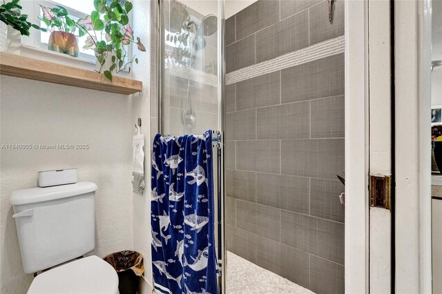 8657 SW 22nd Ct, Miramar, FL 33025 - full bathroom featuring a shower stall and toilet