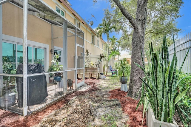 8657 SW 22nd Ct, Miramar, FL 33025 - fenced backyard featuring a lanai