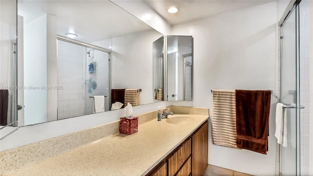 135 Heritage Way, West Palm Beach, FL 33407 - bathroom featuring a stall shower and vanity