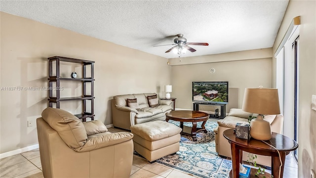 135 Heritage Way, West Palm Beach, FL 33407 - living area with ceiling fan, light tile patterned floors, and a textured ceiling