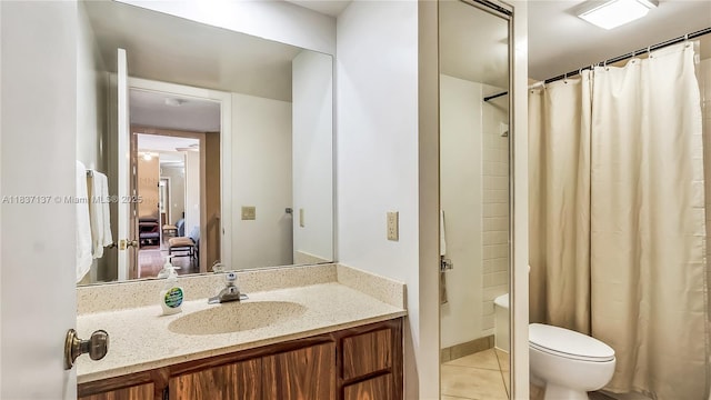 135 Heritage Way, West Palm Beach, FL 33407 - ensuite bathroom with tile patterned floors and vanity