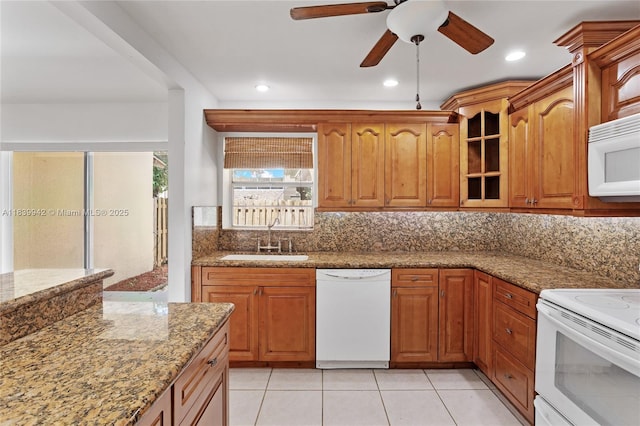8713 SW 137th Ave Unit 8713, Miami, FL 33183 - kitchen featuring white appliances, decorative backsplash, stone countertops, a ceiling fan, and recessed lighting
