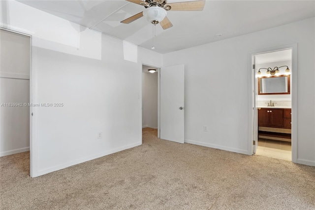 8713 SW 137th Ave Unit 8713, Miami, FL 33183 - unfurnished bedroom with light carpet, ensuite bathroom, a walk in closet, and a ceiling fan