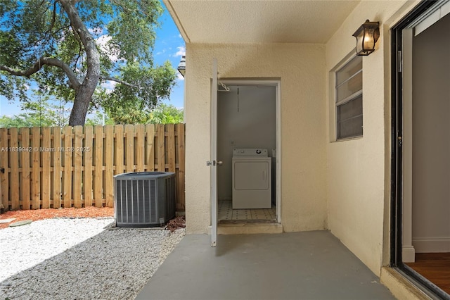 8713 SW 137th Ave Unit 8713, Miami, FL 33183 - view of patio with washer / dryer