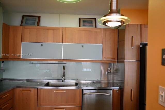2100 W Sans Souci Blvd Unit E1, North Miami, FL 33181 - kitchen featuring dishwasher, brown cabinetry, fridge, and stainless steel counters
