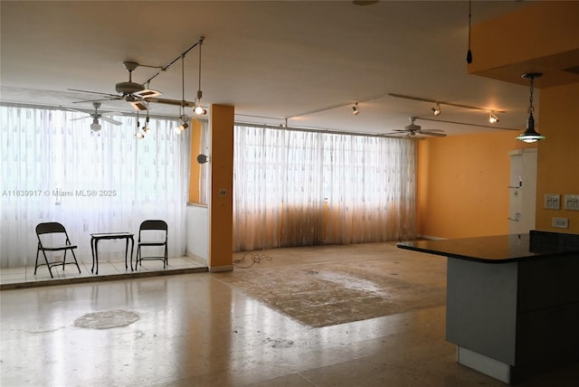 2100 W Sans Souci Blvd Unit E1, North Miami, FL 33181 - unfurnished dining area with ceiling fan and speckle patterned floor