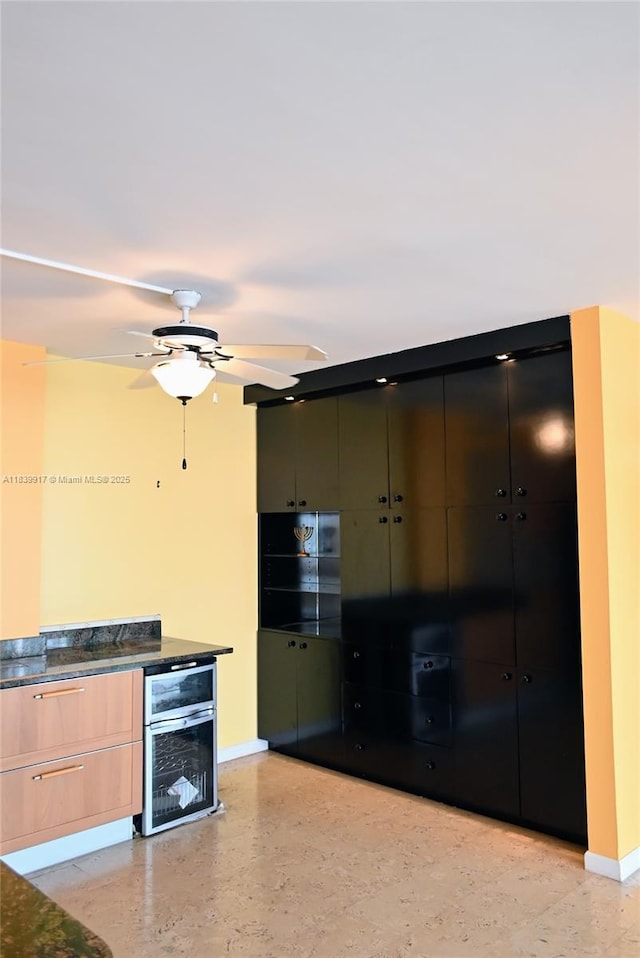 2100 W Sans Souci Blvd Unit E1, North Miami, FL 33181 - kitchen with ceiling fan, modern cabinets, and beverage cooler