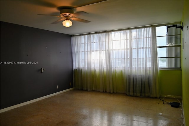 2100 W Sans Souci Blvd Unit E1, North Miami, FL 33181 - empty room featuring ceiling fan