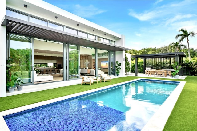 967 NE 117th St, Biscayne Park, FL 33161 - back of property featuring outdoor dining area, an outdoor pool, a yard, a patio area, and an outdoor hangout area