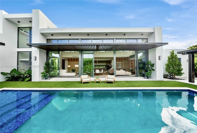 967 NE 117th St, Biscayne Park, FL 33161 - rear view of house with outdoor lounge area, an outdoor pool, a patio, and stucco siding