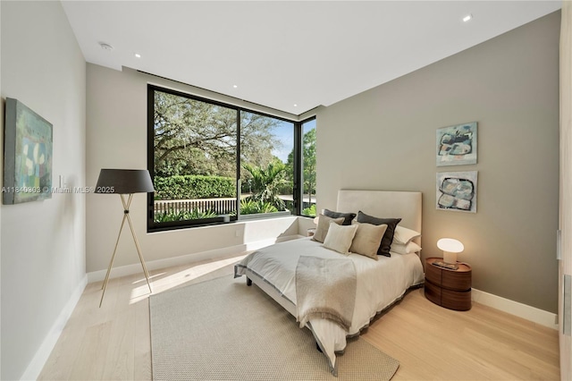 967 NE 117th St, Biscayne Park, FL 33161 - bedroom with light wood-style floors and recessed lighting