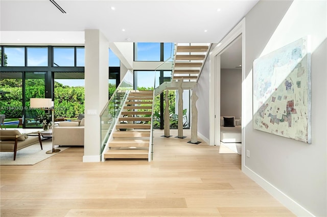 967 NE 117th St, Biscayne Park, FL 33161 - stairway featuring wood finished floors and baseboards