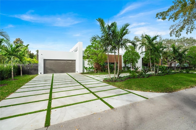 967 NE 117th St, Biscayne Park, FL 33161 - contemporary home featuring stucco siding and a front lawn