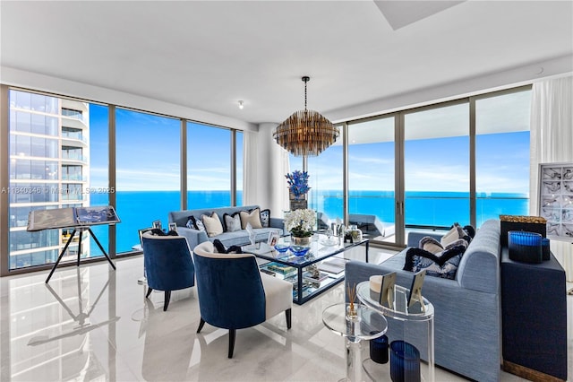 17901 Collins Ave Unit Ts4205, Sunny Isles Beach, FL 33160 - living area with a chandelier, a water view, and expansive windows