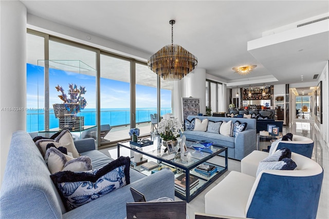 17901 Collins Ave Unit Ts4205, Sunny Isles Beach, FL 33160 - living area featuring a chandelier and a water view