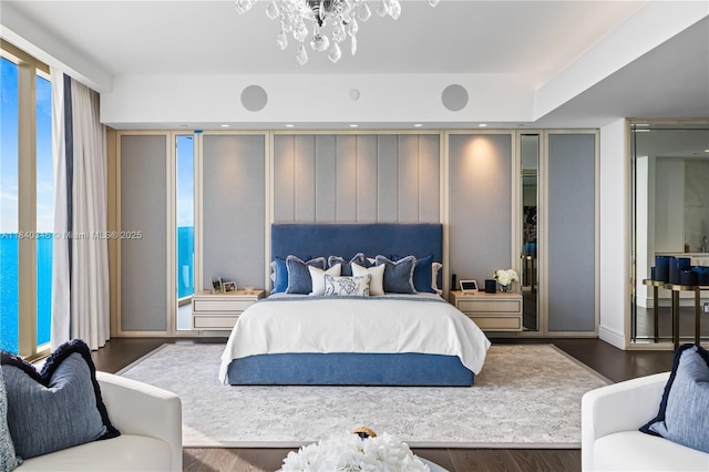17901 Collins Ave Unit Ts4205, Sunny Isles Beach, FL 33160 - bedroom with a chandelier and wood finished floors