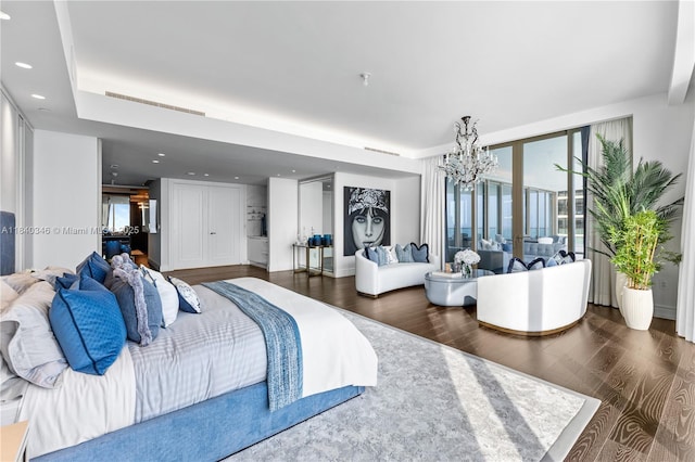 17901 Collins Ave Unit Ts4205, Sunny Isles Beach, FL 33160 - bedroom featuring a chandelier, multiple windows, wood finished floors, and recessed lighting