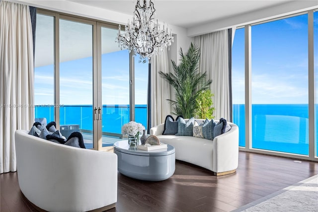 17901 Collins Ave Unit Ts4205, Sunny Isles Beach, FL 33160 - living room featuring a chandelier, wood finished floors, and a water view