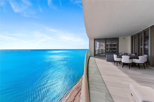 17901 Collins Ave Unit Ts4205, Sunny Isles Beach, FL 33160 - balcony with a water view and an outdoor hangout area