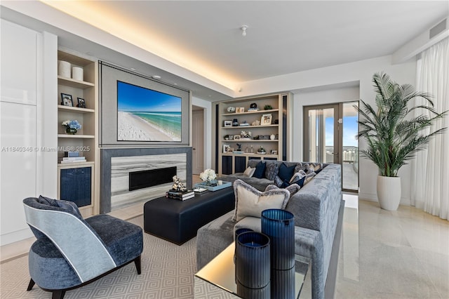 17901 Collins Ave Unit Ts4205, Sunny Isles Beach, FL 33160 - living area featuring built in features, a premium fireplace, and french doors