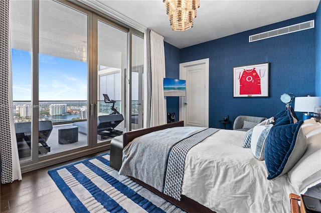 17901 Collins Ave Unit Ts4205, Sunny Isles Beach, FL 33160 - bedroom featuring wood finished floors and a wall of windows