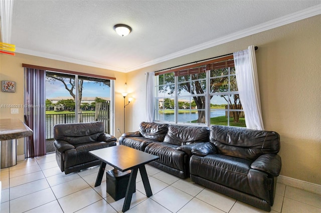 9333 SW 227th St Unit 8-6, Cutler Bay, FL 33190 - living room featuring ornamental molding, a water view, light tile patterned flooring, and a textured ceiling