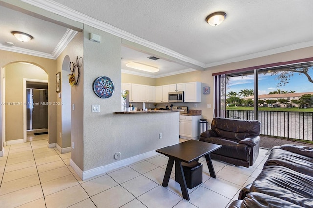 9333 SW 227th St Unit 8-6, Cutler Bay, FL 33190 - living room with arched walkways, crown molding, light tile patterned flooring, and a textured ceiling