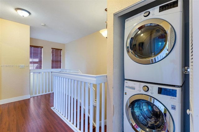 9333 SW 227th St Unit 8-6, Cutler Bay, FL 33190 - washroom featuring stacked washer / drying machine and wood finished floors