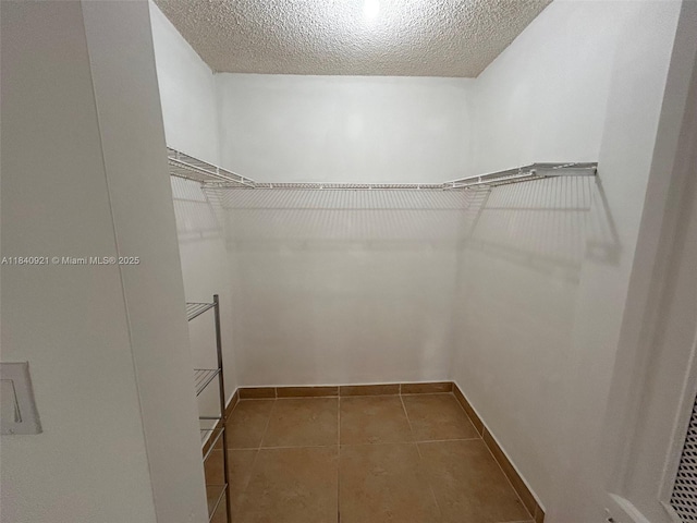 16919 N Bay Rd Unit 204, Sunny Isles Beach, FL 33160 - spacious closet with tile patterned flooring