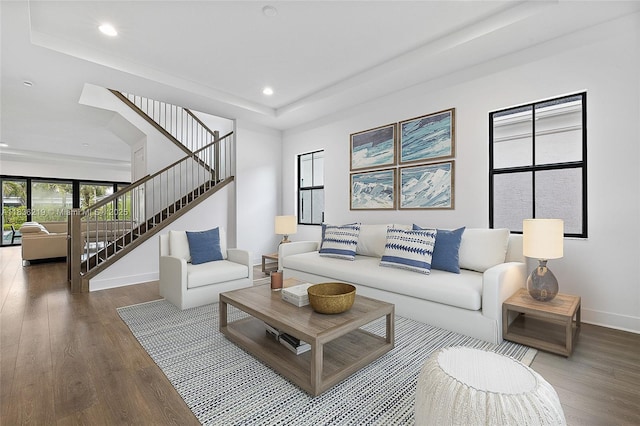 13467 Artisan Cir, Palm Beach Gardens, FL 33418 - living area featuring wood finished floors, a raised ceiling, recessed lighting, and stairway